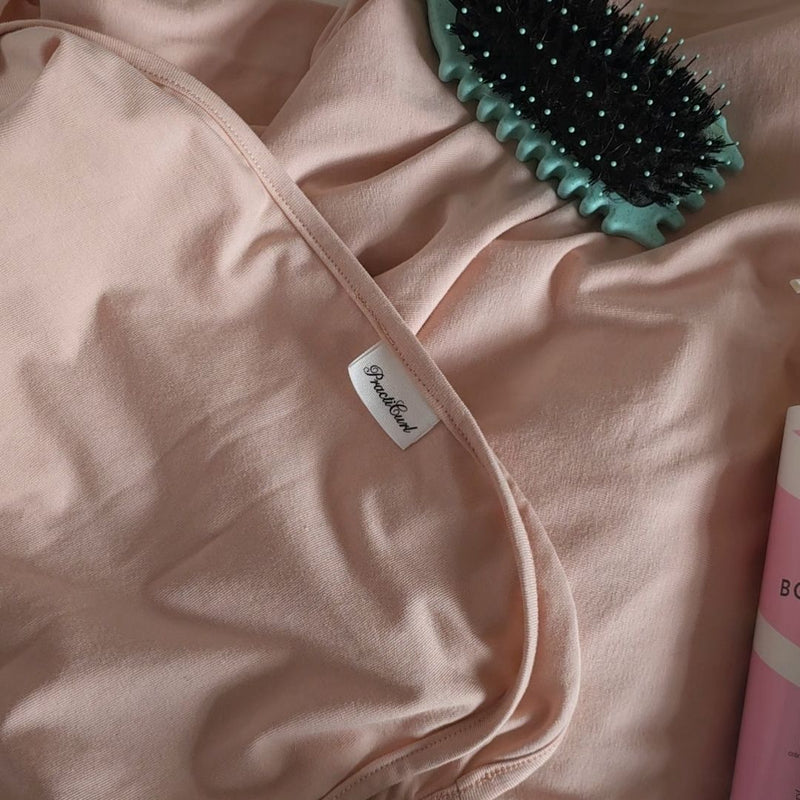 Why Your Towel Is Ruining Your Curls (And What to Use Instead)